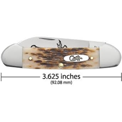 CASE 00263 AMBER BONE PEACH SEED JIG CANOE